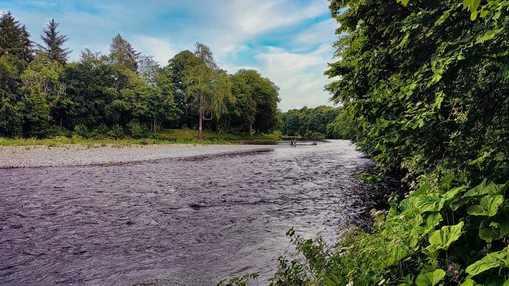 Saint Cuthbert's Way river bend fishers in the distance